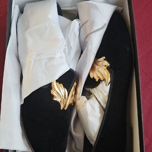 Chic Black Loafers with Gold Detailing